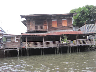 Wooden stilt house by the water.
