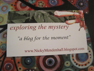 Blog card on colorful patterned background.