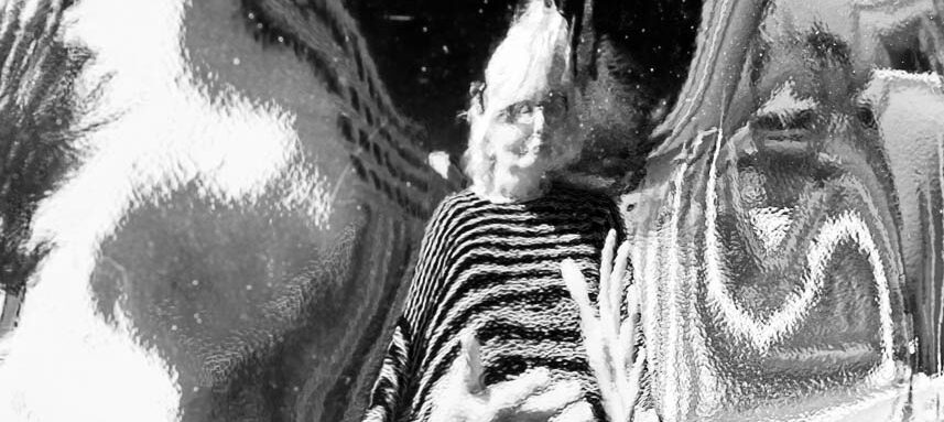 Striped sweater reflection in warped metal