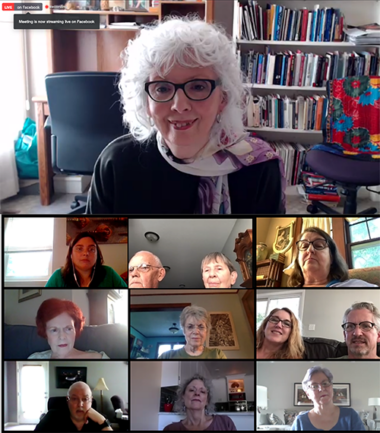 Video call with multiple participants on screen.