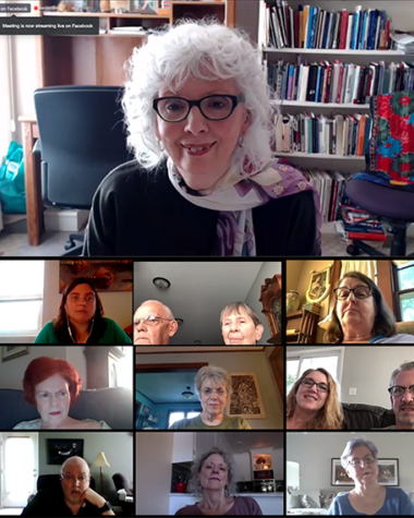 Video call with multiple participants on screen.