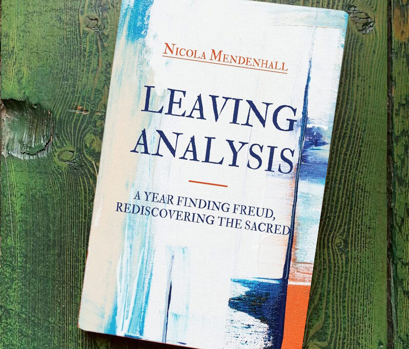 Book titled "Leaving Analysis" on green surface.